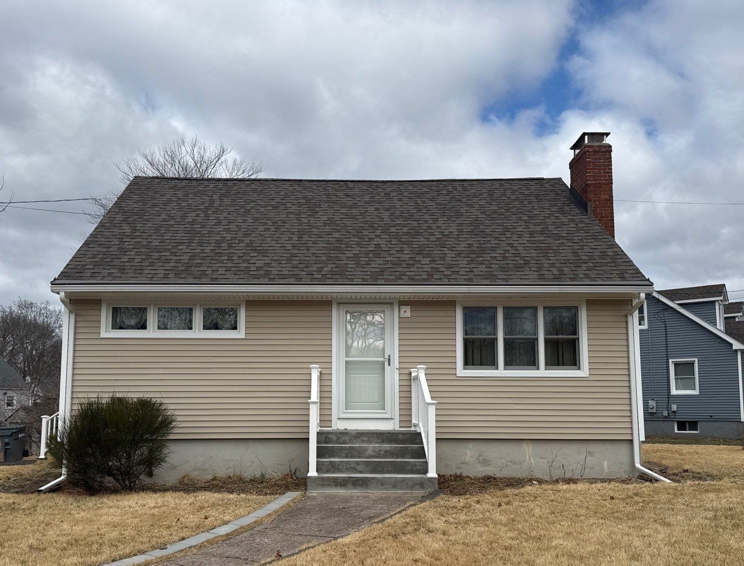 A tan home exterior