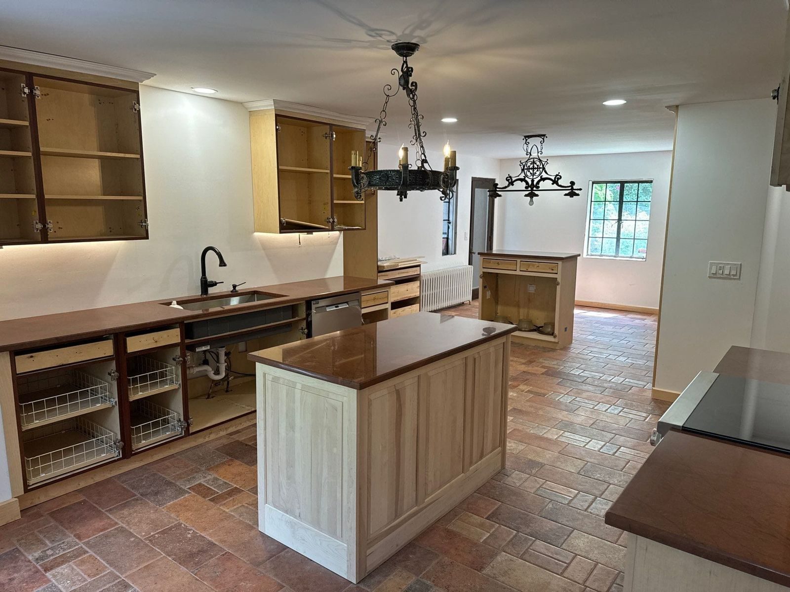 A remodeled kitchen with a center island